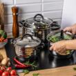 Set 4 oale, din inox, cu capac, manere negre ,16/18/20/24cm, Klausberg