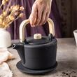 Suport din fonta pentru infuzoarele de ceai, diametru 17 x 2 cm, negru, Kinghoff