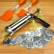 Aparat pentru ornat tort, biscuiti si prajituri, din inox, 20 discuri + 4 duze de ornat, 25 piese, Kinghoff