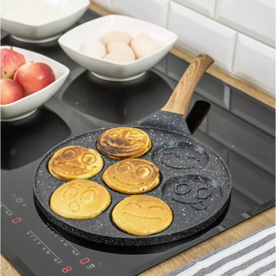 Tigaie cu strat din marmura pentru oua si clatite cu 7 fete zambitoare, 26.5 cm, Kinghoff